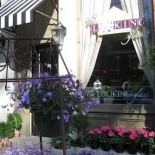 storefront with lots of flowers